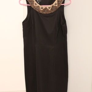 black shift dress with beaded collar